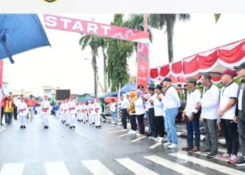 Rangkaian HUT Kabupaten Nunukan ke 25, Hujan Deras Tak Menyurutkan Semangat Peserta Lomba Gerak Jalan